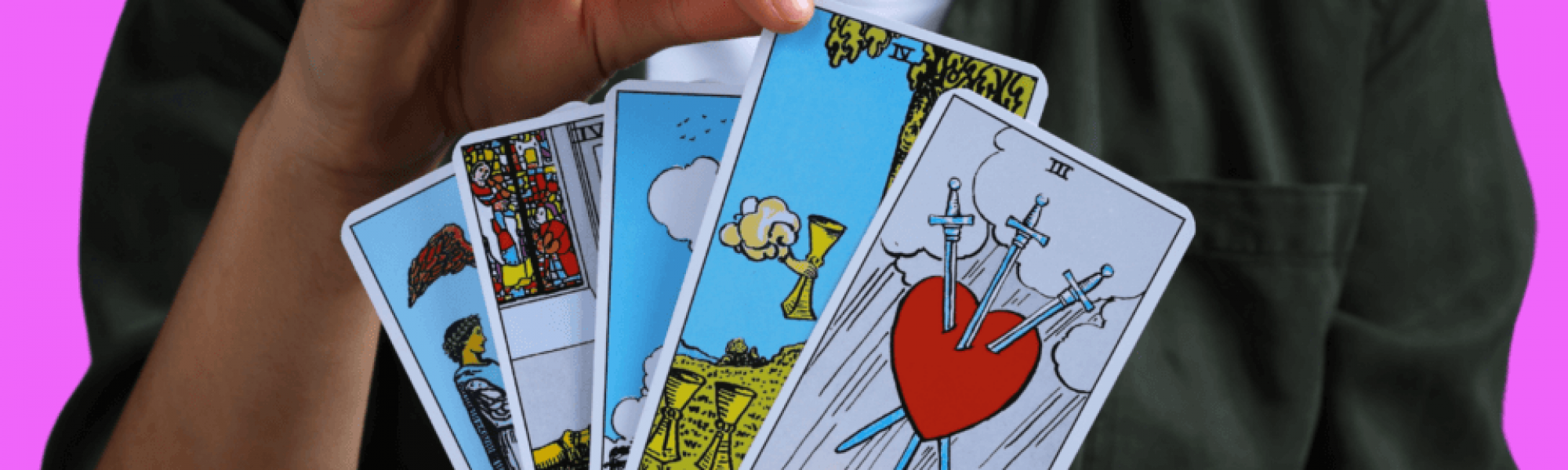 A person holding a deck of psychic cards.